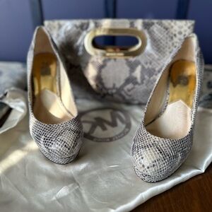 Used Michael Kors Embossed Leather Dark Sand Size 9 & matching Clutch